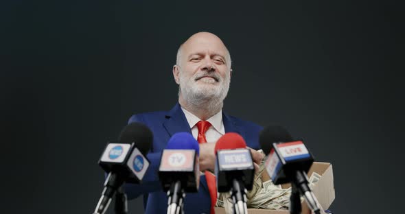 Politician throwing money at the audience during a press conference