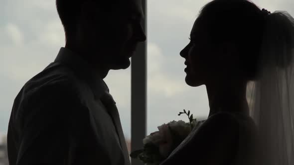 Bride and Groom Go To Each Other at the Meeting. Silhouette