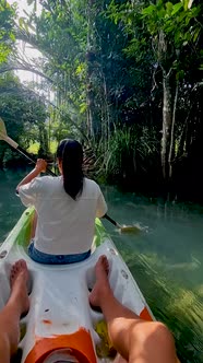 Couple in Kayak in the Jungle of Krabi Thailand Men and Woman in Kayak at a Tropical Jungle in Krabi