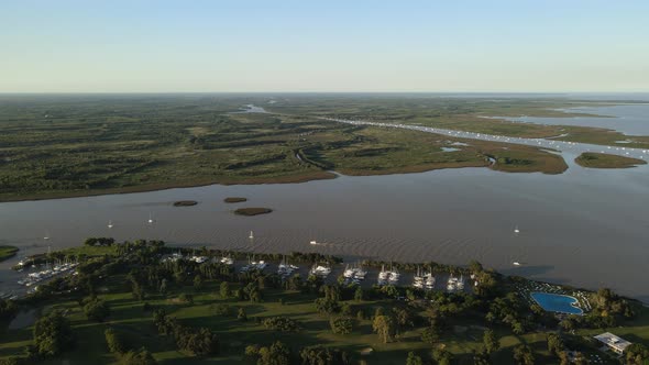 Aerial establishing shot of a river mouth to La Plata river in San Isidro, Buenos Aires