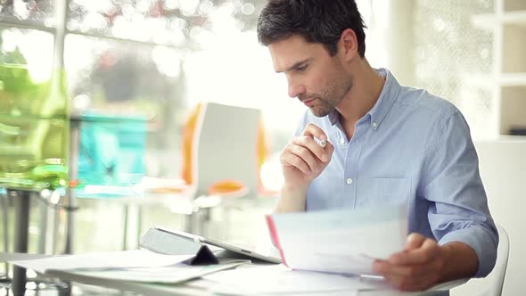 Man using digital tablet in office