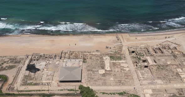 Aerial footage of the ancient remains of the coastal city of Caesarea, built under Herod the Great d