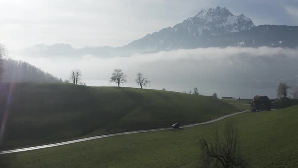 Aerial view of beautiful mountains with clouds in winter, Lucerne, Switzerland.