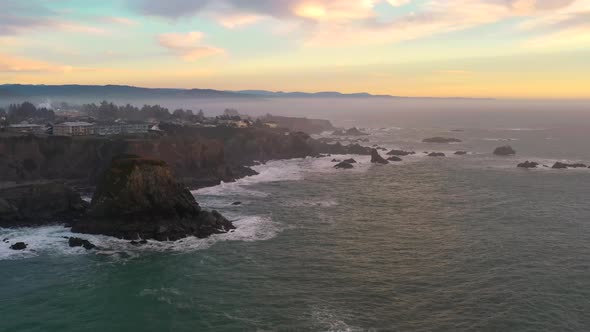 Colorful sunset aerial drone shot of Brookings, Oregon, USA. United States west coast Pacific Ocean.