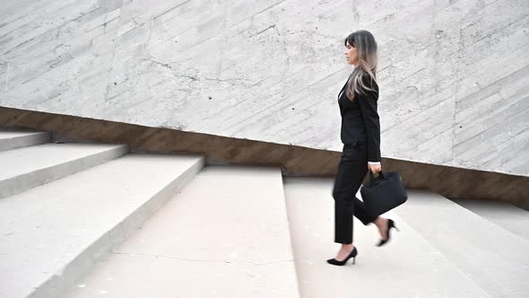 Business Woman Wearing Heels Climbing the Stairs in the City. 