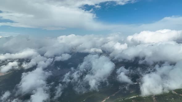 Cloudy landscape high in the mountains aerial view 4 K