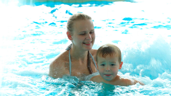 Mother And Her Son In the Swimming Pool