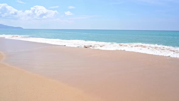 Beautiful tropical beach sea ocean with blue sky and white cloud