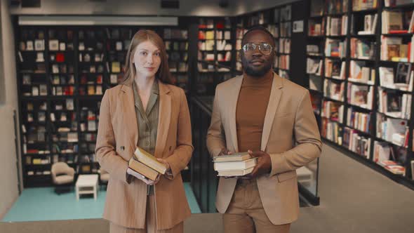 Portrait of Young Professors at Library