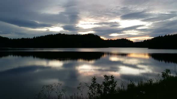 Lake Sunset in Arendal Jorstadvann Norway.  UHD Timelapse