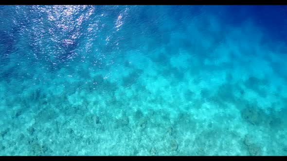Aerial drone view texture of perfect island beach break by blue green water with white sand backgrou
