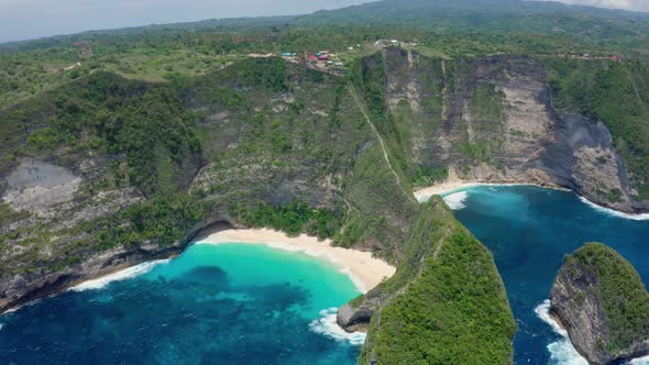 Aerial View of Kelingking Beach in Nusa Penida Island Beautiful Ocean Mountains