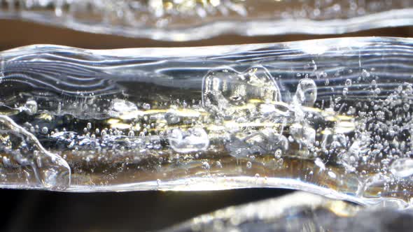 Large Icicle with Bubbles of White Colour and Different Form