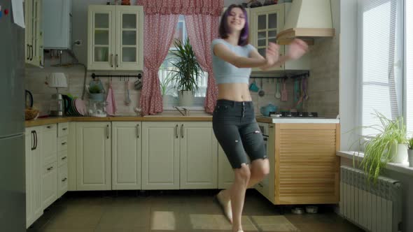 Young Beautiful Woman Dancing Kitchen At Home