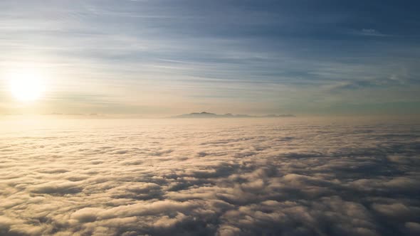 Aerial view of False bay covered in low cloud sunrise, Simonstown, Cape Town, South Africa.