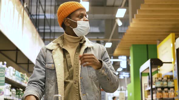 Professional Shopper in Blue Denim Jacket and Face Mask