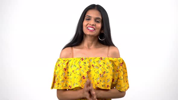 Happy Indian girl saying Thank you