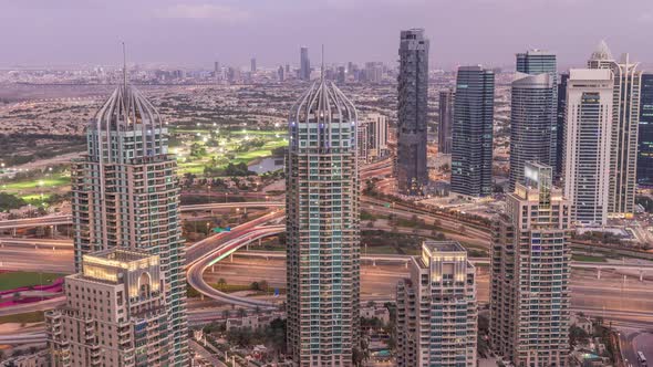 Dubai Marina Skyscrapers and Jumeirah Lake Towers View From the Top Aerial Day to Night Timelapse in