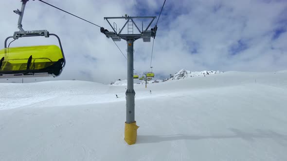 Chair Lifts In Action In Ski Areas In The Swiss Alps