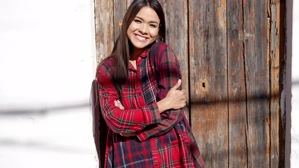 Smiling Woman with Crossed Arms