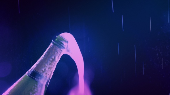 Fizzy Bottle Of Champagne In Party Lights