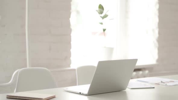 Man Coming to Creative Place of Work