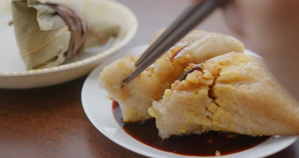 Chinese rice dumpling with soy sauces