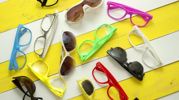 Collection of Various Style and Color Sunglasses and Frames Captured From Above