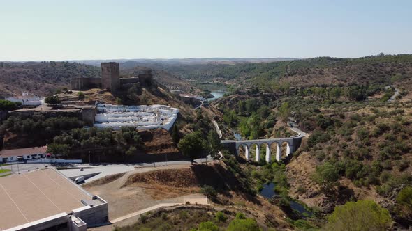 Mertola Castle And Bridge From Ermida de Nossa Senhora das Neves In Portugal. - aerial approach