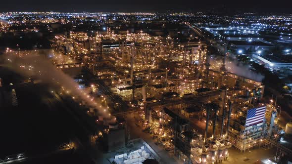 Aerial Topdown Footage Over the Territory of Modern Petroleum Refinery at Night.