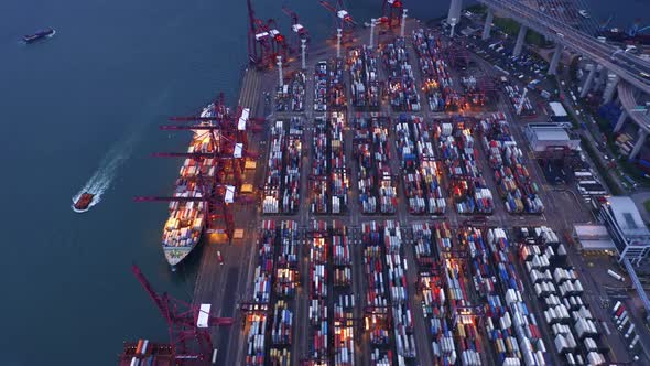 Aerial top view of container in logistics or shipping business at Victoria Harbour, Hong Kong.