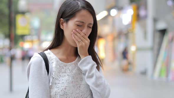 Woman suffer from nose allergy due to air pollution