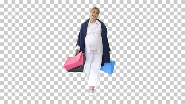 Beautiful happy pregnant woman walking, Alpha Channel