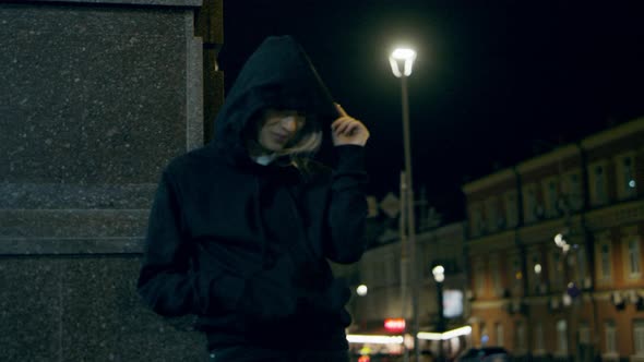 Smiling Woman Waiting Street at Late Night in Downtown City Lights