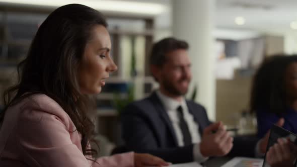 Employees Team Talking Finance Development in Multiethnic Company Office Centre