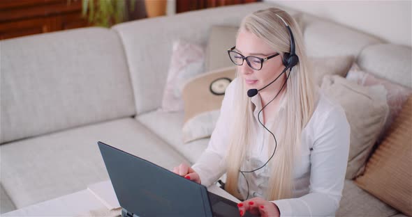 Portrait of Saleswoman Working on Laptop.