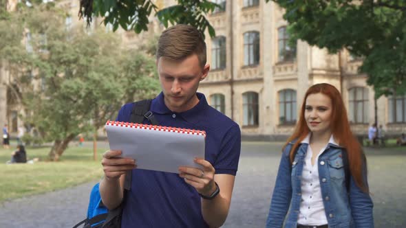 Female Student Shuts Her Friend's Eyes on Campus