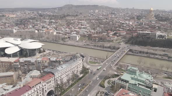 Tbilisi, Georgia - April 5 2021: Aerial view of Baratashvili Bridge and Public Registry.