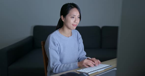 Woman use of computer at home