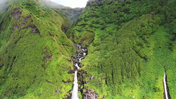 Aerial view of a waterfall on Flores Island, Azores, Portugal.