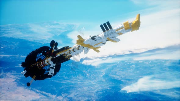 Futuristic Spaceship Near the Earth. Elements of This Image Furnished By NASA alt