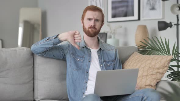 Thumbs Down By Man at Work,  Looking at Camera