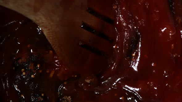 BBQ sauce being cooked from scratch in ultra slow motion