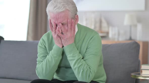 Worried Old Man Sitting Tense at Home