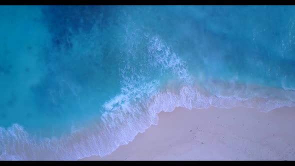 Aerial drone view sky of exotic seashore beach holiday by transparent water with bright sand backgro