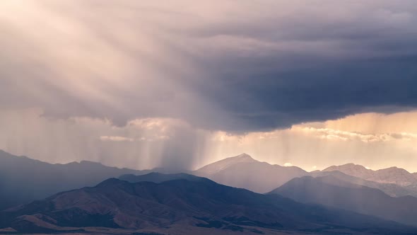 Timelapse of rain storm moving over mountain tops in Utah