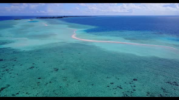 Aerial abstract of tranquil coastline beach vacation by aqua blue sea with white sandy background of