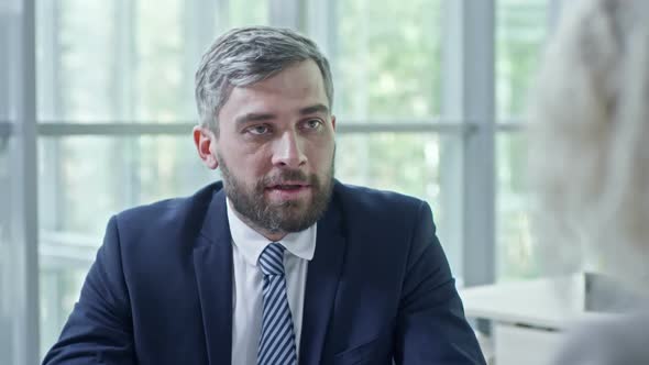 Businessman Talking on Job Interview