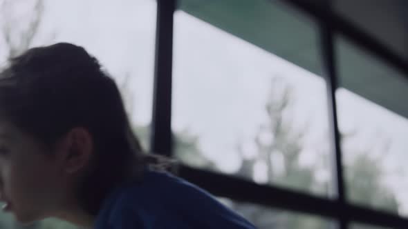 Unhappy Schoolboy Looking Window Sitting Hall Close Up alt