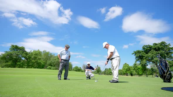 4K Group of Asian people golfer golfing together at country club.